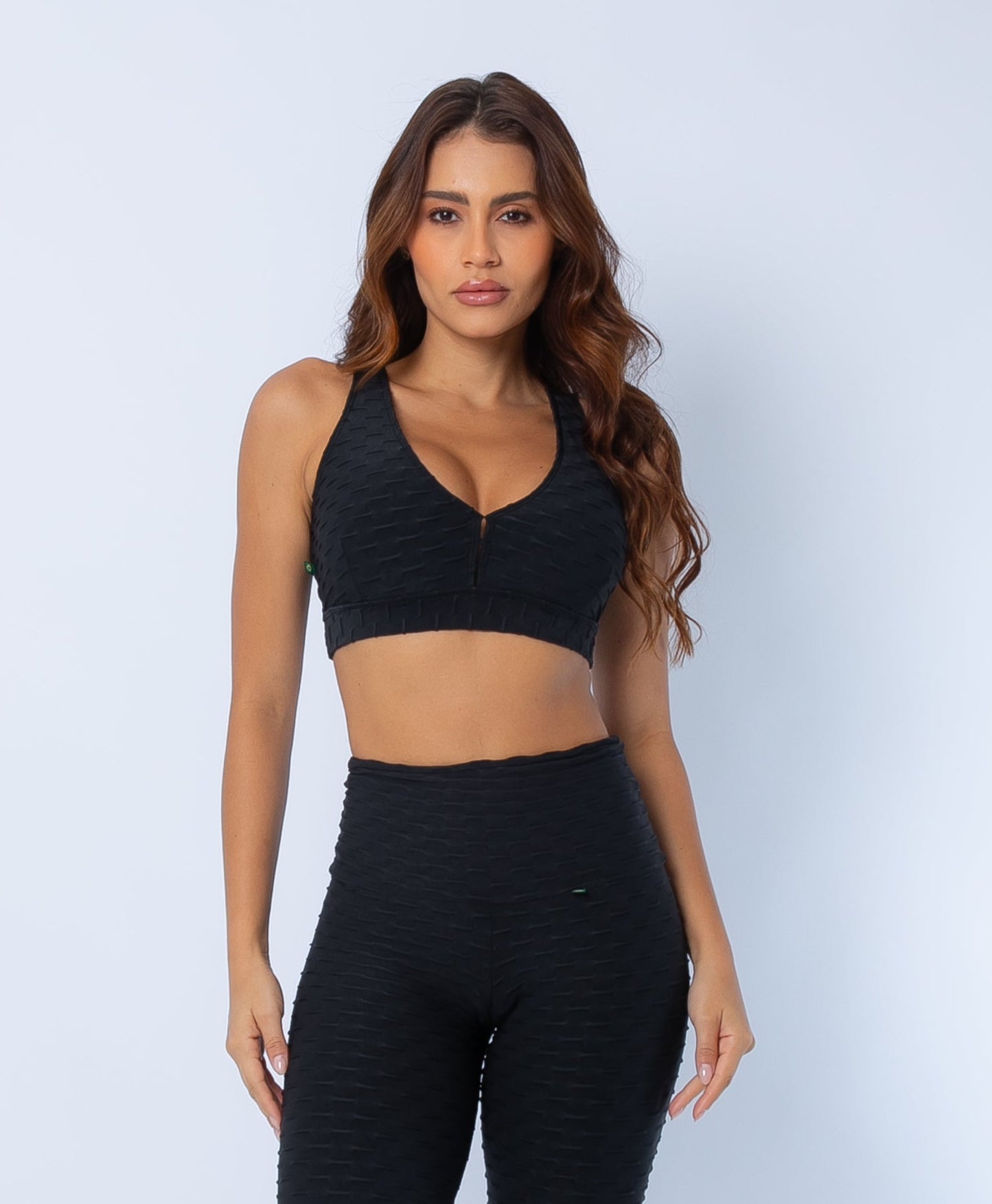 Black high impact zero flaws sports bra and high waisted scrunch booty shorts