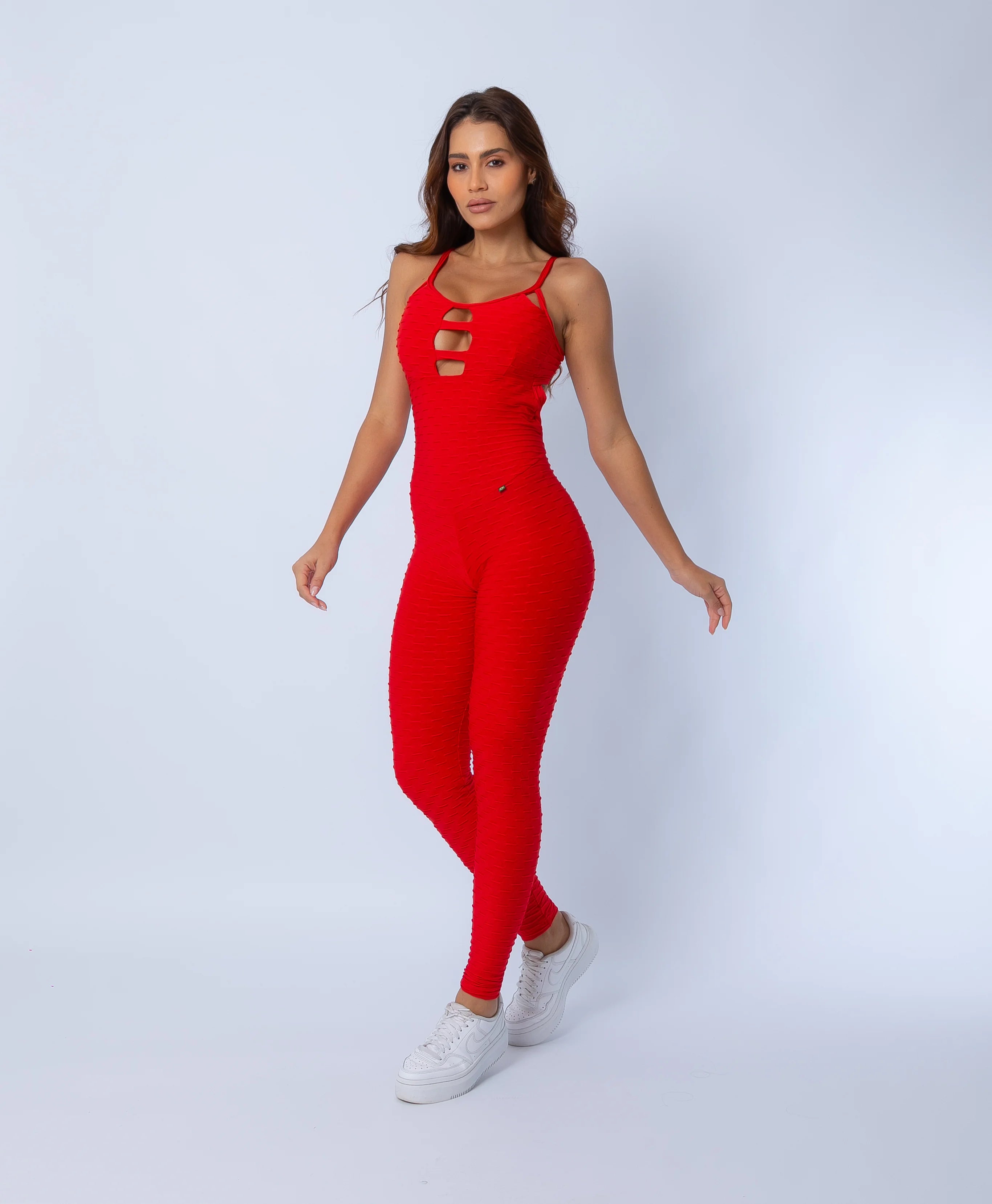 Fashion Brazil Amelia Red Jumpsuit, side view showing contouring fit, full-length sculpting legs, and sleek red finish.