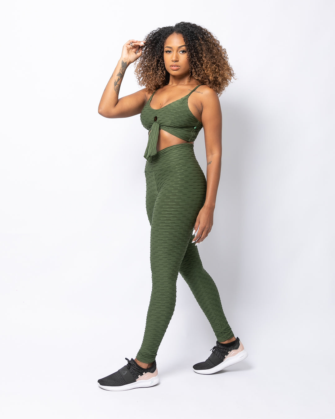 side view of scrunch booty leggings and crop top